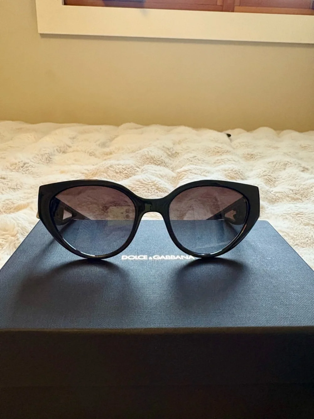 Dolce & Gabbana Black Cat-Eye Sunglasses with Gold Accents - Picture 2 of 4